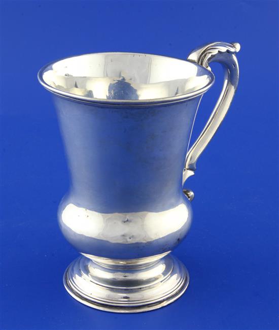 A William IV silver vase shaped pedestal cup, 9.5 oz.